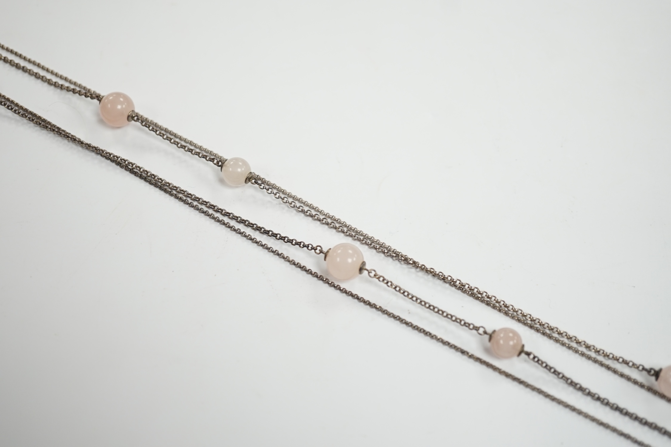A modern Georg Jensen twin strand silver and rose quartz twelve stone rose quartz sphere set necklace, 98cm, with Georg Jensen box.